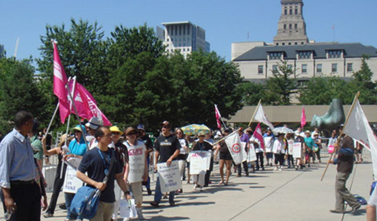 500 striking Toronto municipal workers and their supporters rallied outside Toronto city hall Wednesday 